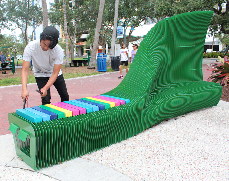 Project 5: Each of the musical benches is custom designed for the space in which they are located. The forms of the bench are created to encourage a multitude of seating interactions from a romantic couple on a date to a spontaneous jam session.
Photo credit: The Urban Conga