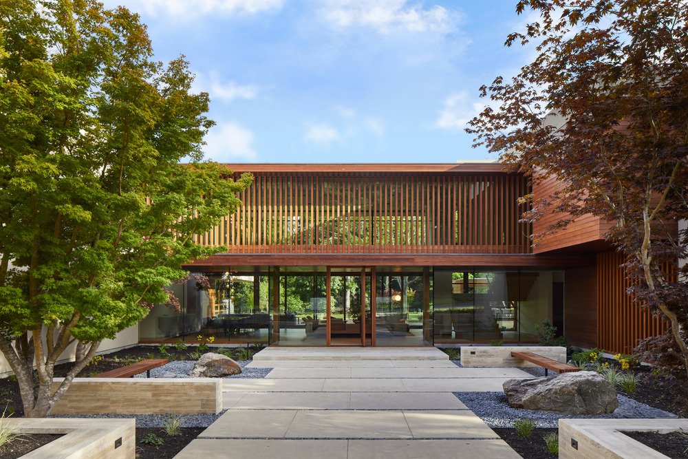 Happy Valley Residence: The site for this new 10,800 square foot home is a prized 2.3 acre level parcel, bordered by a year-round creek The plan is a simple “H” shape with an entry courtyard on the north side and a large covered lanai on the south side.
Photo credit: Russell Abraham