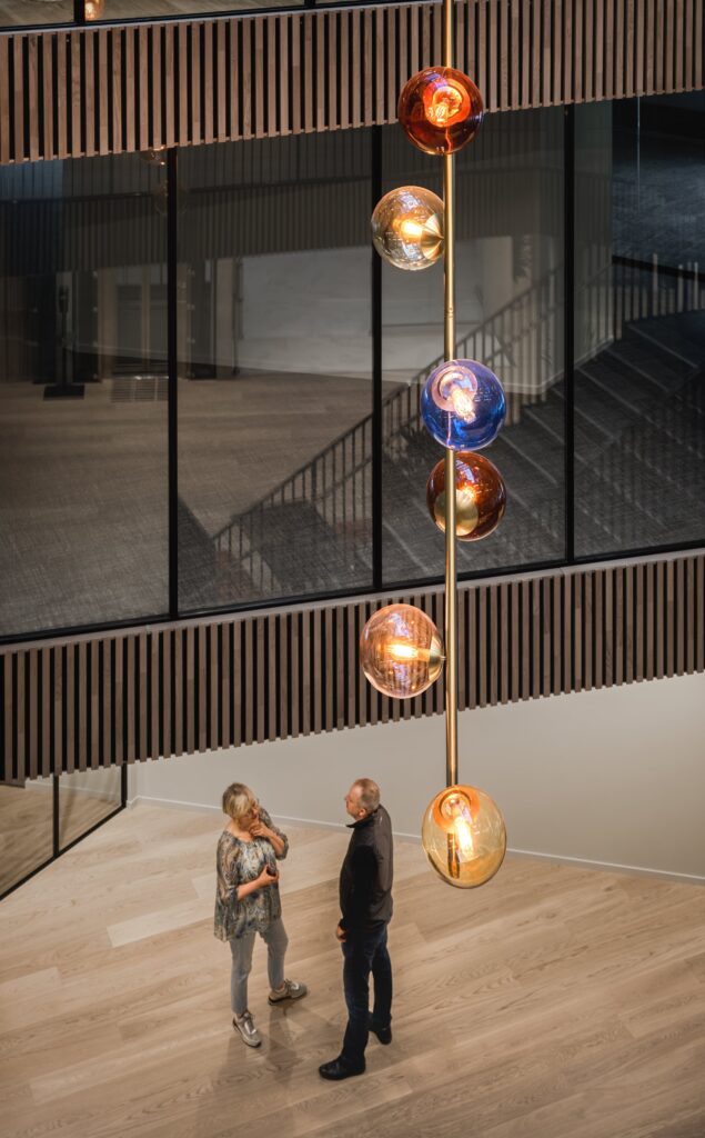 Radiant Aura of 106 Hand-Blown Glass Orbs
