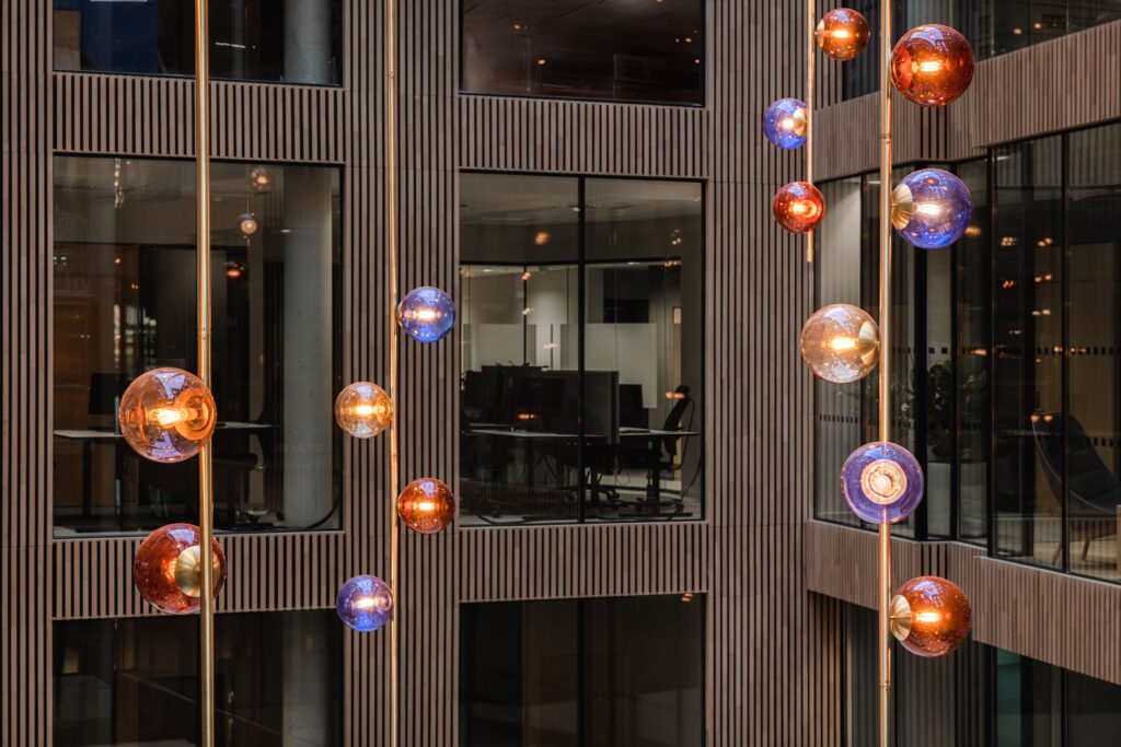 Radiant Aura of 106 Hand-Blown Glass Orbs