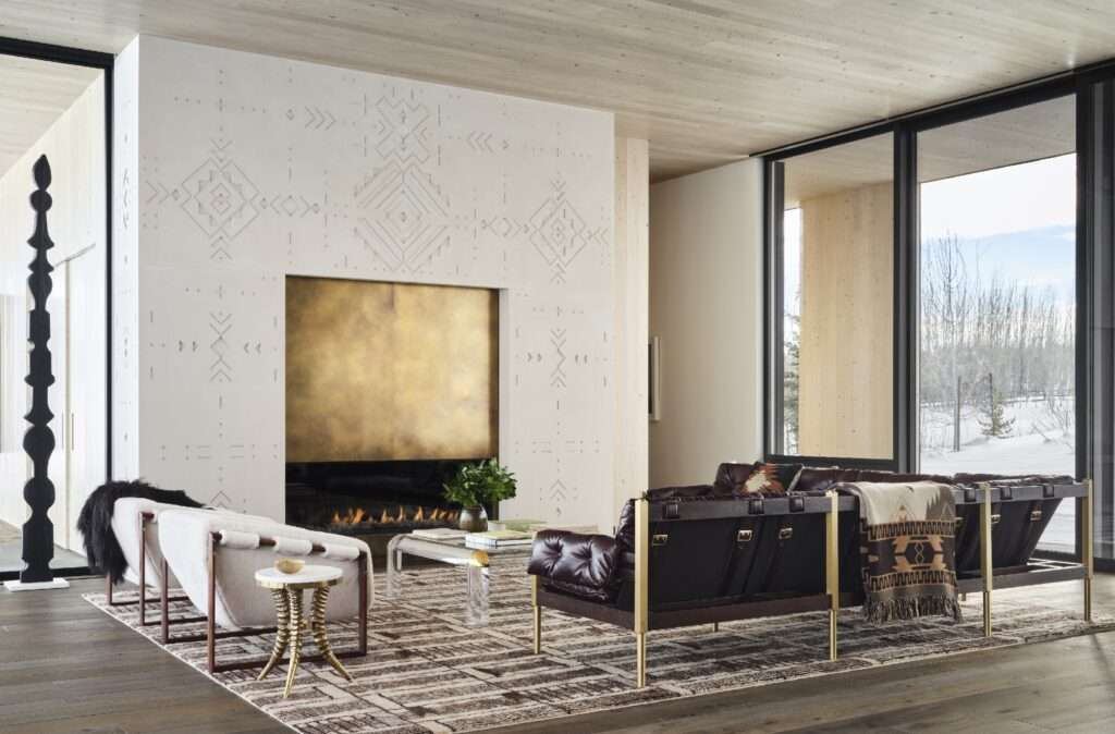 An expansive, bespoke retreat for a California couple, and their two Irish Wolfhounds in the mountains of Jackson Hole, Wyoming. Using expressively-scaled stone slabs, custom cabinetry, and pieces from cult-beloved designers, this space imagines a three-structure compound, including a main house, guest house and writer's studio, in perfect Mountain Modern style.