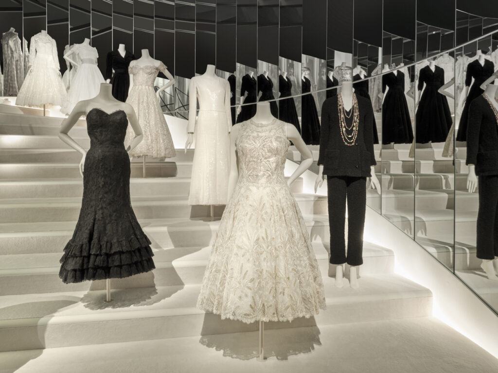 Light moves constantly across the stair at the exact tempo of film footage, projected alongside