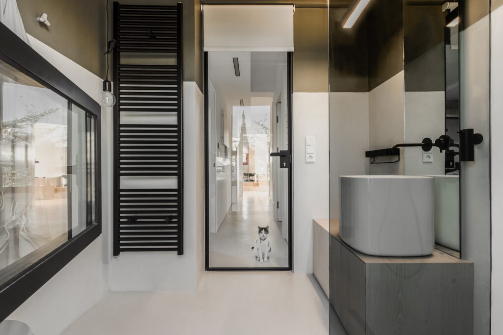 View towards communal space from the master bathroom_ Photo by Athina Souli