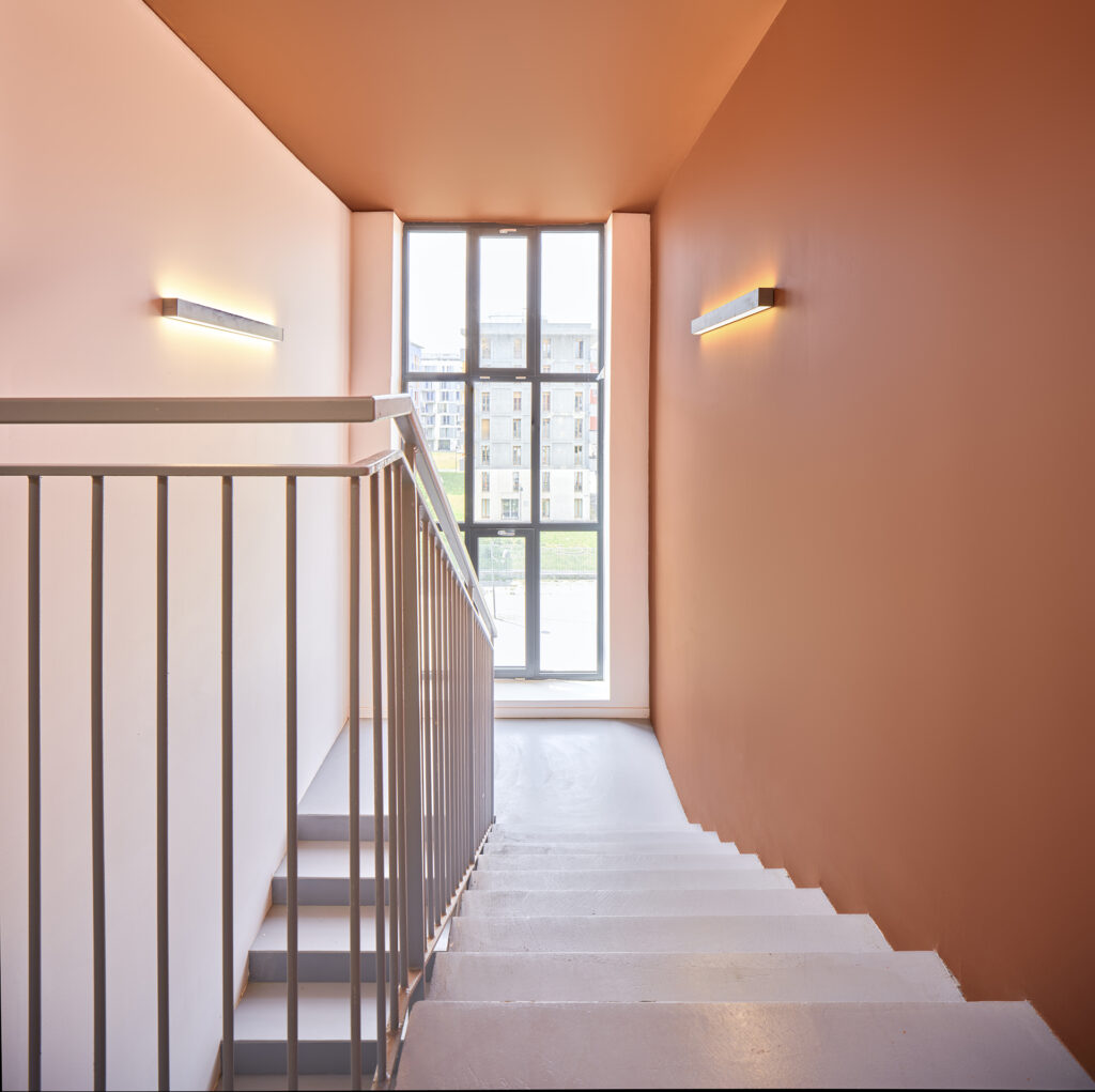 From Europe's Largest Occupied Center to New Student and Social Housing at the Former Olympic Village