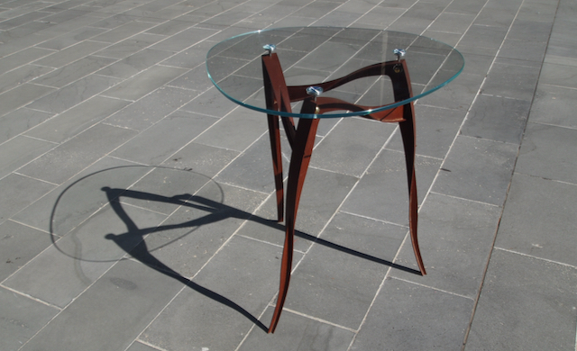 Sculptural Table Where Metal Blooms