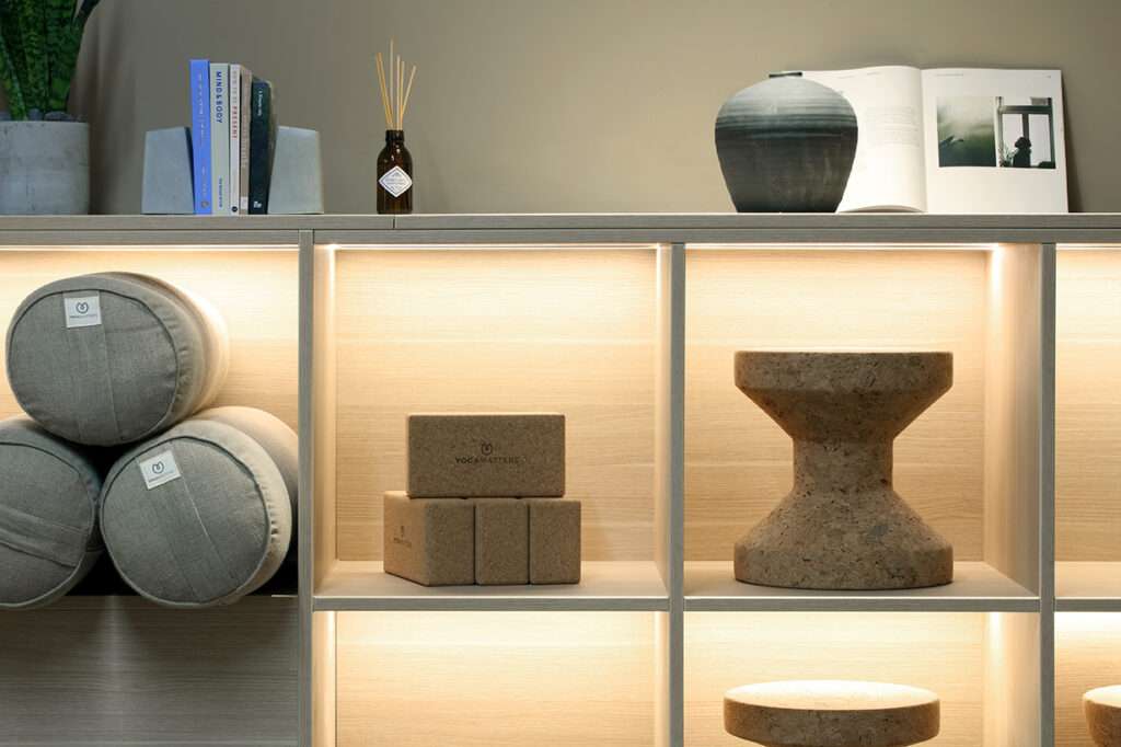 Joinery unit allowing mats and small stools to be stored out of sight