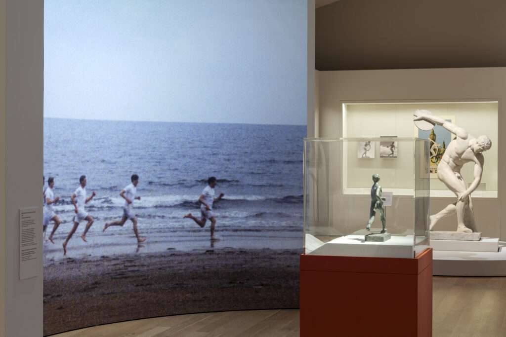 A centrepiece arena section has a still from 'Chariots of Fire' as a backdrop