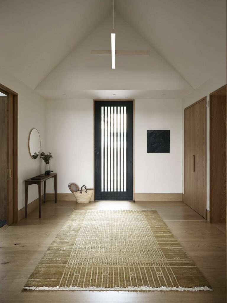 Atelier Échelle Turns a Family Legacy into a Riverfront Masterpiece