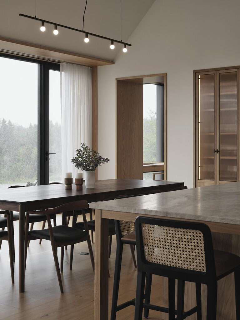 Atelier Échelle Turns a Family Legacy into a Riverfront Masterpiece