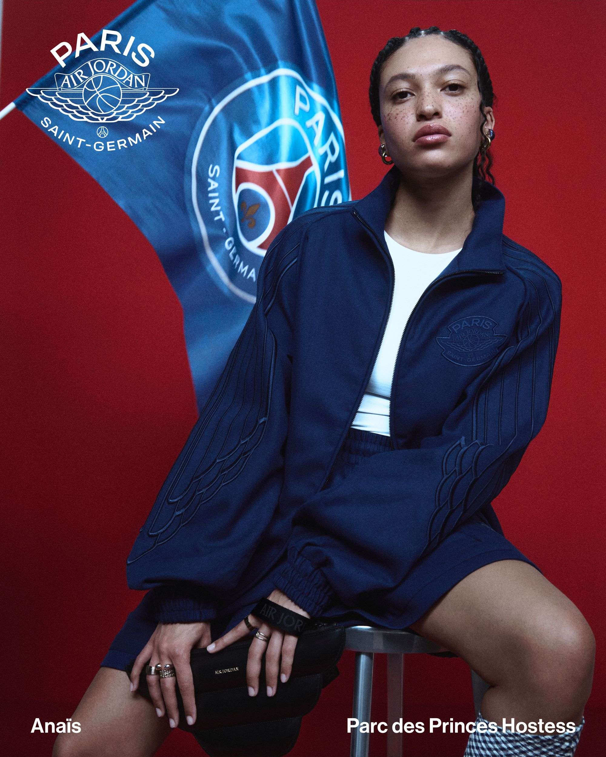 A Paris Saint-Germain fan since she was young, Anaïs works as a hostess in the Parc des Princes, witnessing the inner workings of the legendary PSG stadium. For her, PSG has always been more than a club — it’s a source of inspiration and pride. She is wearing the Jordan Wings x Paris Saint-Germain wool Anthem jacket, inspired by Michael Jordan’s iconic Chicago uniform. She’s styled the jacket with the collection’s Diamond short, which is made of 100% Italian wool. A wing-shaped calfskin handbag completes her look.