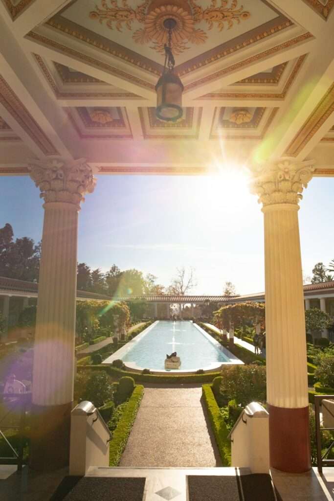 white concrete outdoor fountain during daytime