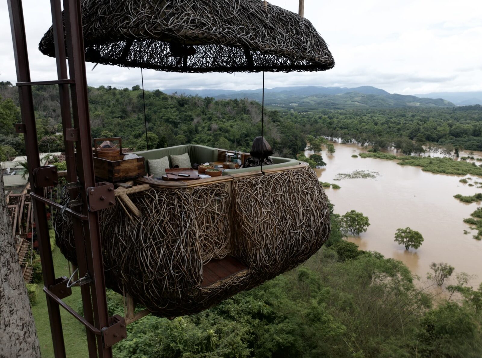 At the 2024 LIV Hospitality Design Awards, Rockventure claimed the prestigious Architectural Design of the Year – Eating Space for Canopy, an extraordinary dining capsule suspended 52 metres above the jungle floor at the Anantara Golden Triangle Elephant Camp & Resort. With panoramic views over the borders of Thailand, Myanmar, and Laos, and design elements inspired by local craftsmanship and natural materials, Canopy is a remarkable fusion of adrenaline and serenity.