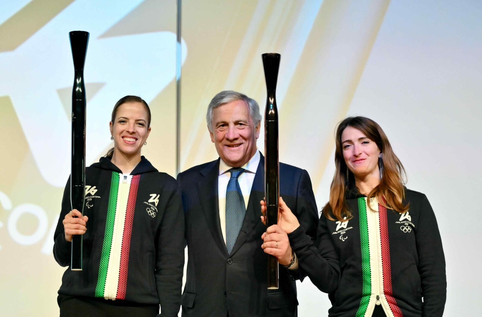 Martina Caironi, Carolina Kostner, and Antonio Tanjani in Osaka.
Photo credit: Courtesy of Milano Cortina 2026