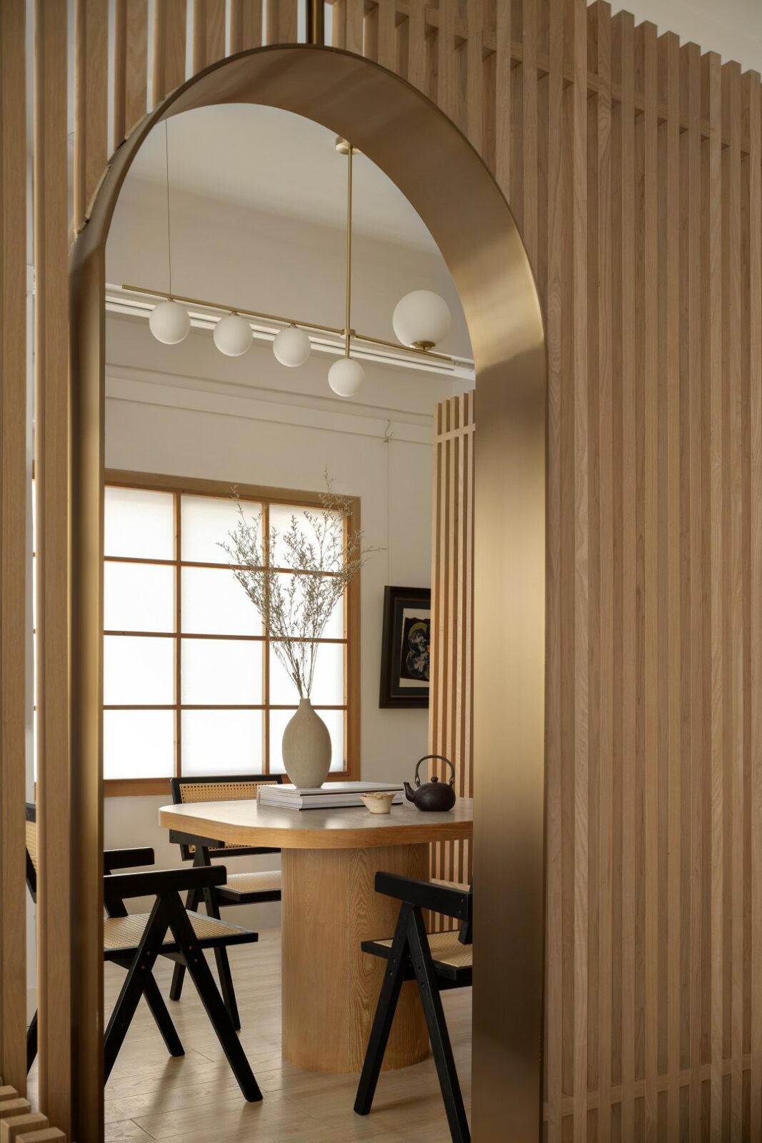 Lim + Lu's An Artist's Teahouse is a calm, beautifully layered hideaway where creativity and tradition sip tea together. Set in a sleepy little village in Foshan, the 200-square-meter space feels like the artist's own quiet rebellion against noise, equal parts thoughtful design and personal sanctuary.