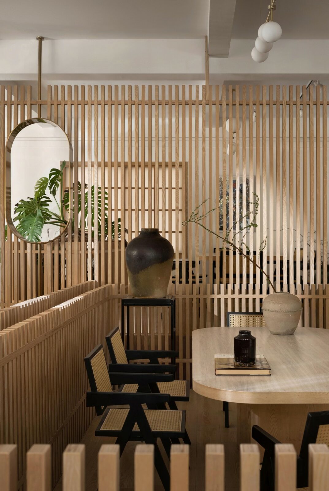 Lim + Lu's An Artist's Teahouse is a calm, beautifully layered hideaway where creativity and tradition sip tea together. Set in a sleepy little village in Foshan, the 200-square-meter space feels like the artist's own quiet rebellion against noise, equal parts thoughtful design and personal sanctuary.