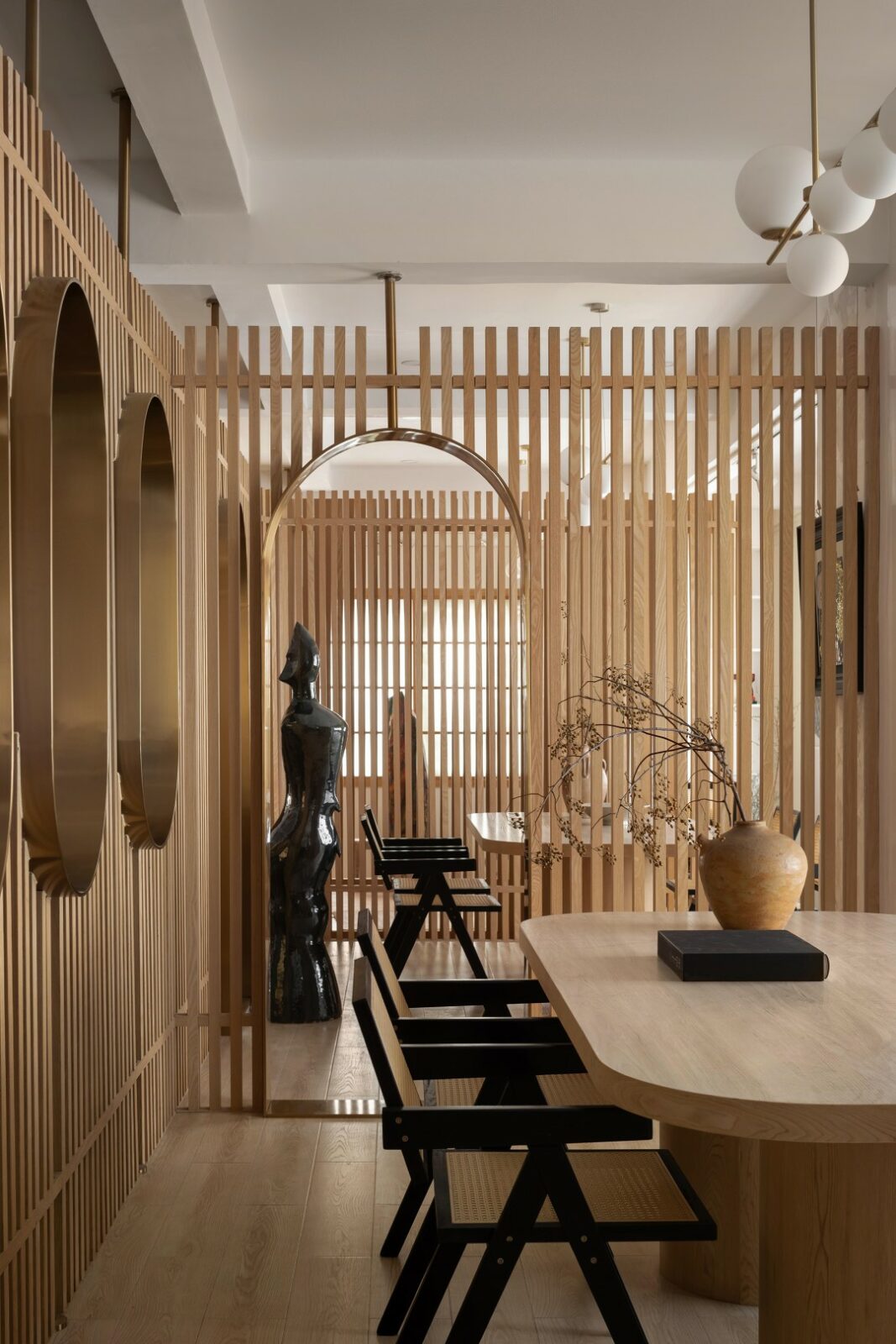 Lim + Lu's An Artist's Teahouse is a calm, beautifully layered hideaway where creativity and tradition sip tea together. Set in a sleepy little village in Foshan, the 200-square-meter space feels like the artist's own quiet rebellion against noise, equal parts thoughtful design and personal sanctuary.