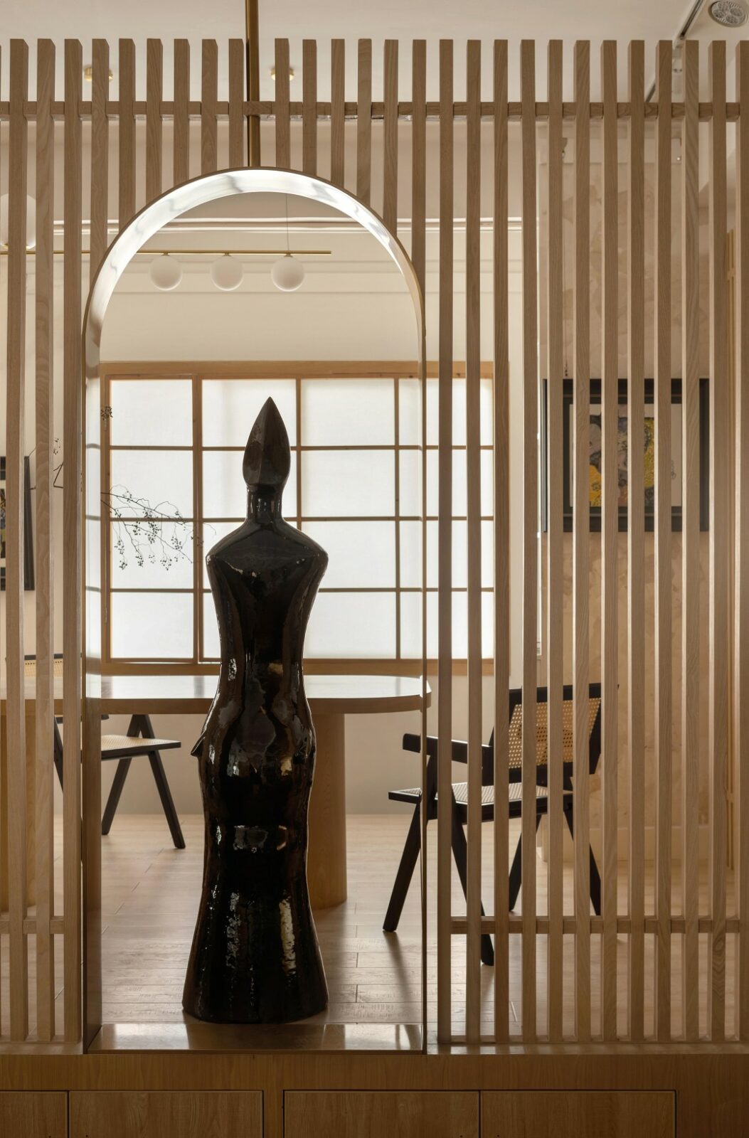 Lim + Lu's An Artist's Teahouse is a calm, beautifully layered hideaway where creativity and tradition sip tea together. Set in a sleepy little village in Foshan, the 200-square-meter space feels like the artist's own quiet rebellion against noise, equal parts thoughtful design and personal sanctuary.