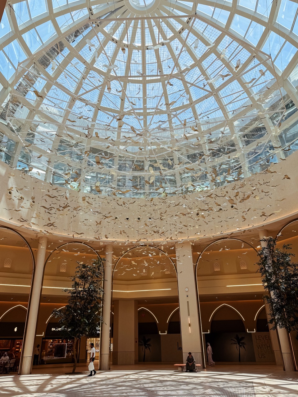 A Stunning Glass Art Installation Fills the Dome at Dubai Mall with Light and Movement