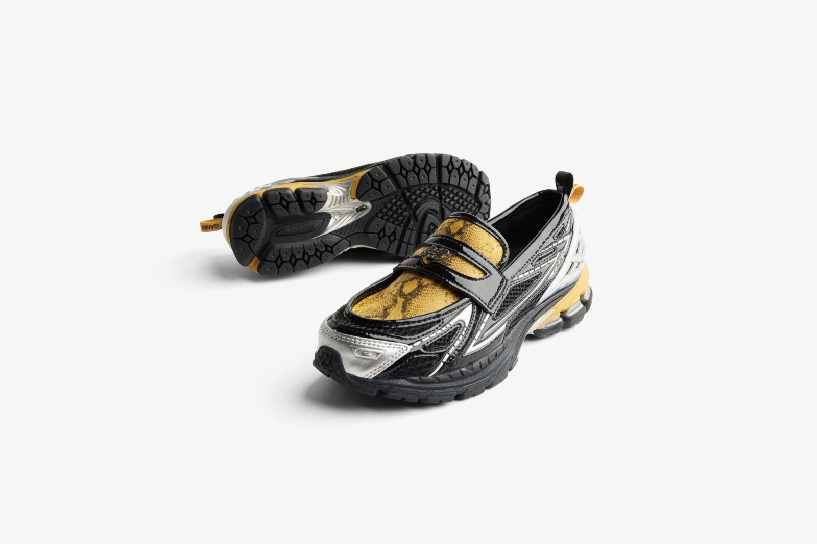 GANNI x New Balance 1906L features black, silver and snake skin patterns