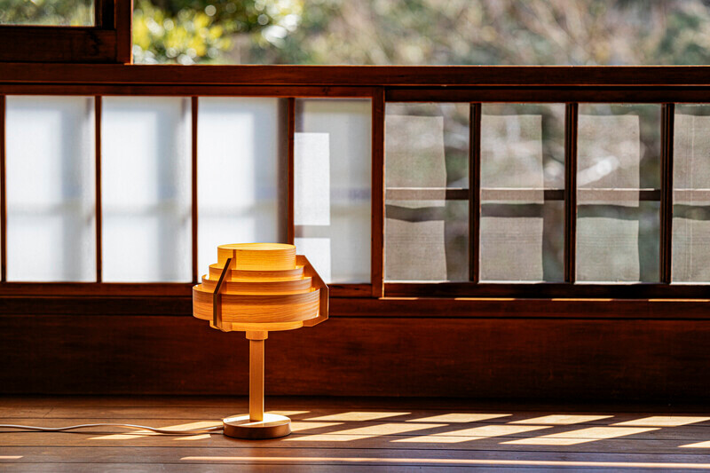 Jakobsson Table lamp is made completely from pine wood.