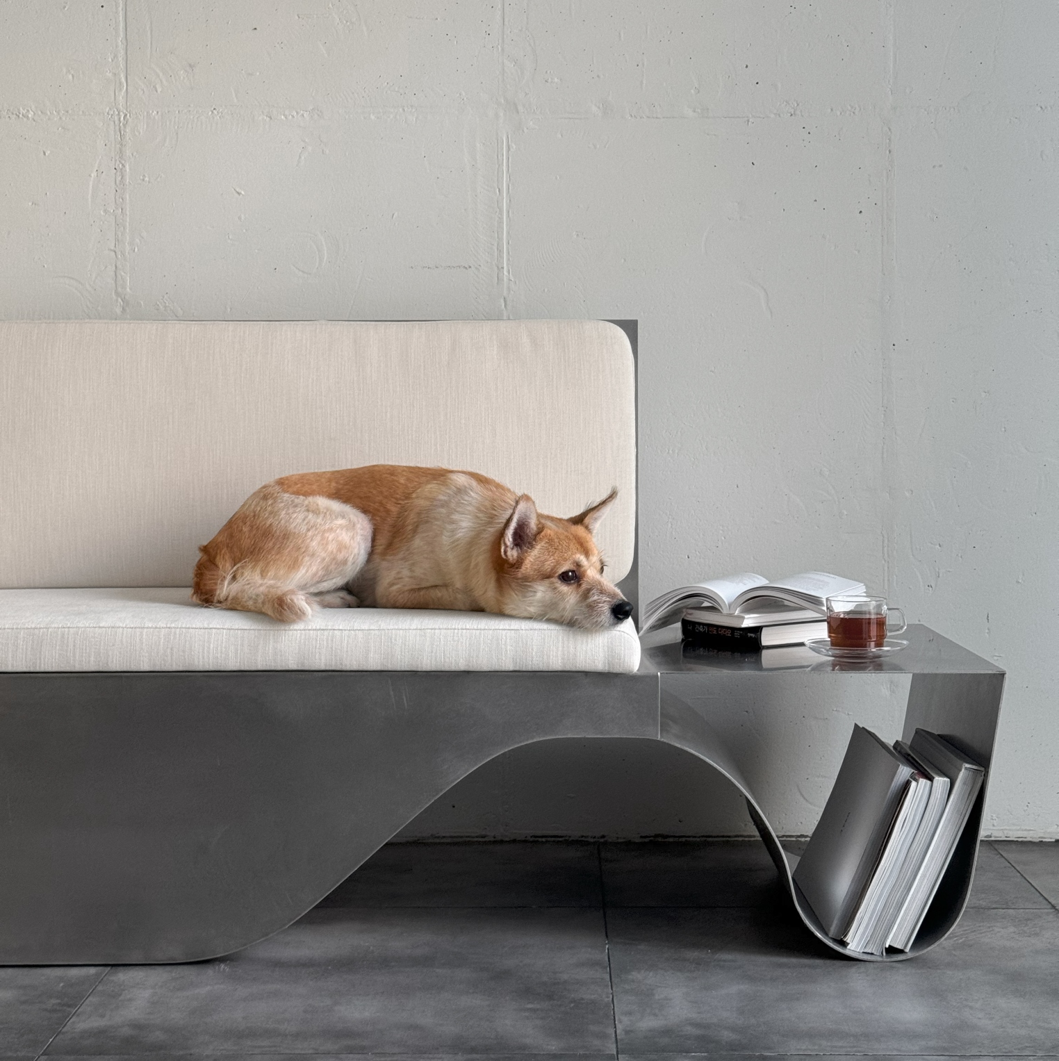 Flow Sofa doubles as a side table