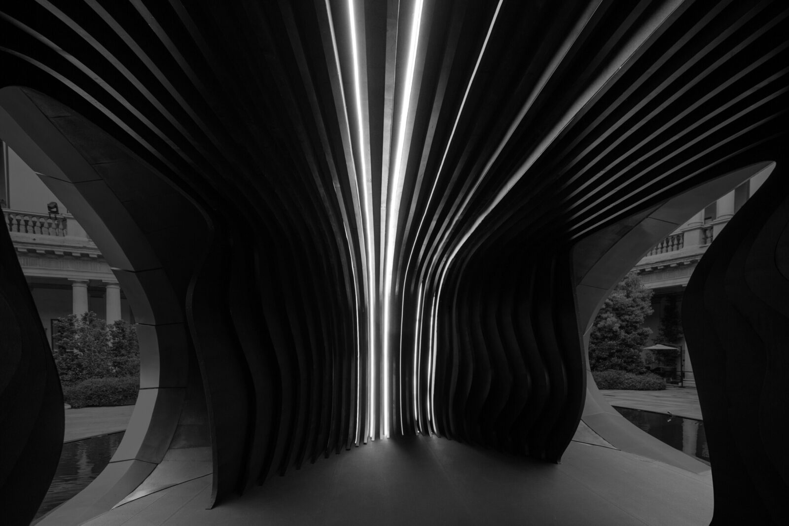 Interior view of the installation Origin. The interplay of light, material and spatial composition creates an immersive environment that invites visitors to focus their perception and experience a moment of calm within Milans urban setting.