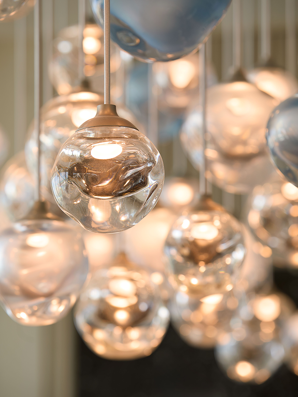 In Dew glass chandeliers by Nulty Bespoke
