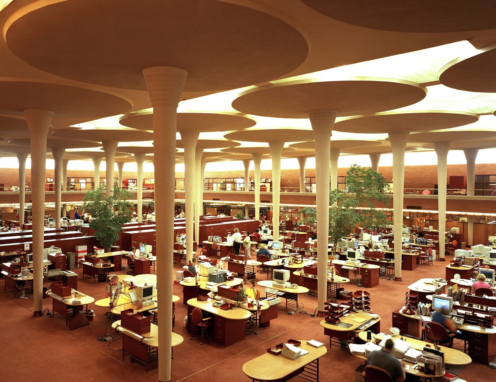 Work area at the Johnson Wax Building, headquarters of the S.C. Johnson and Son Co. The building and its furnishings were designed by Frank Lloyd Wright.