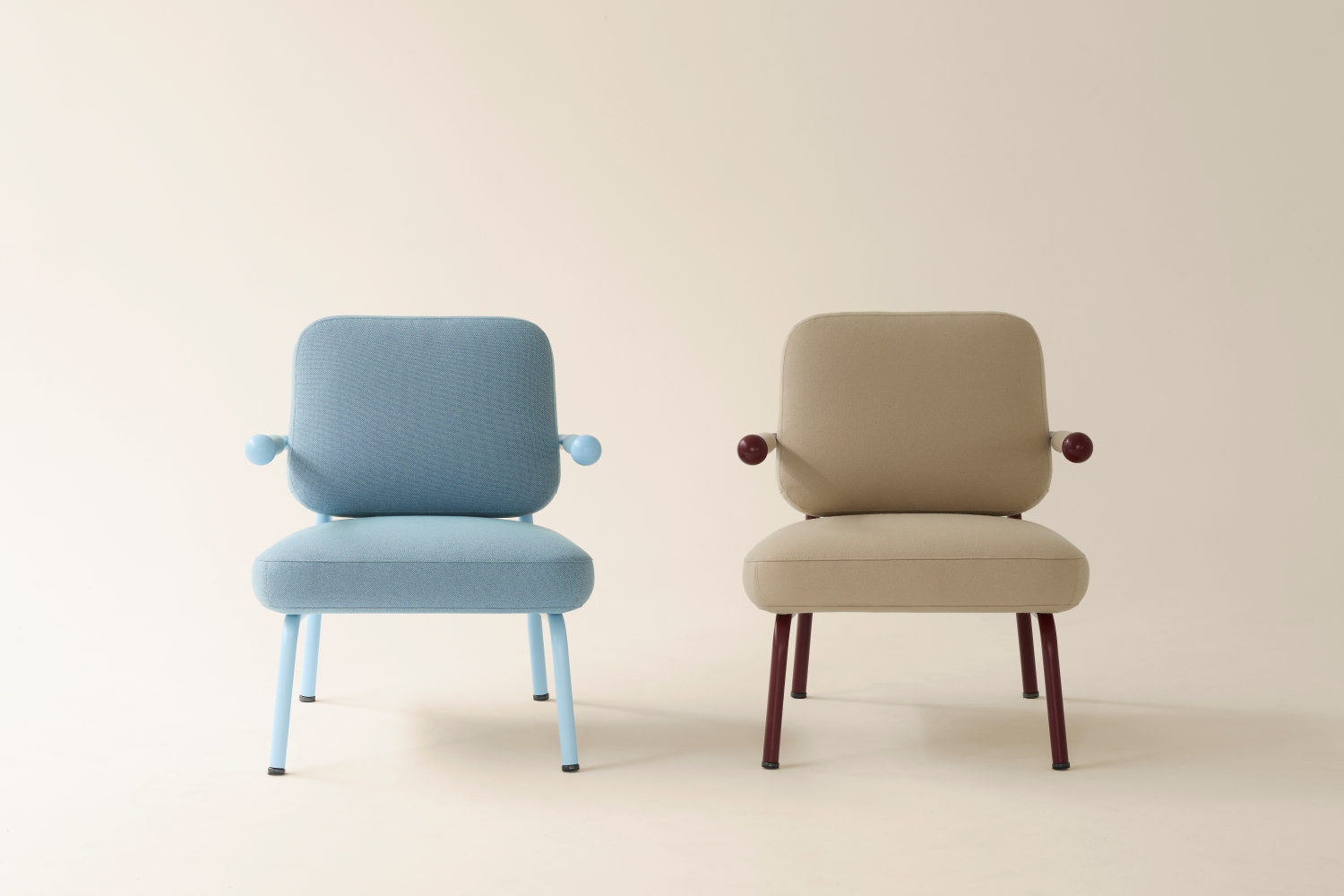 Two Pohm Lounge Chairs