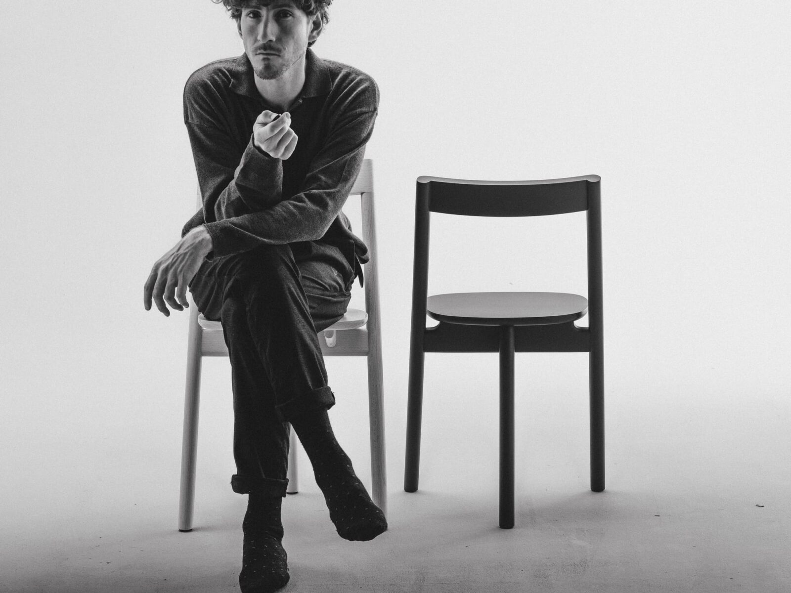 Mezza Chair: Three-legged dining chair by Ignacio Merino , Italy