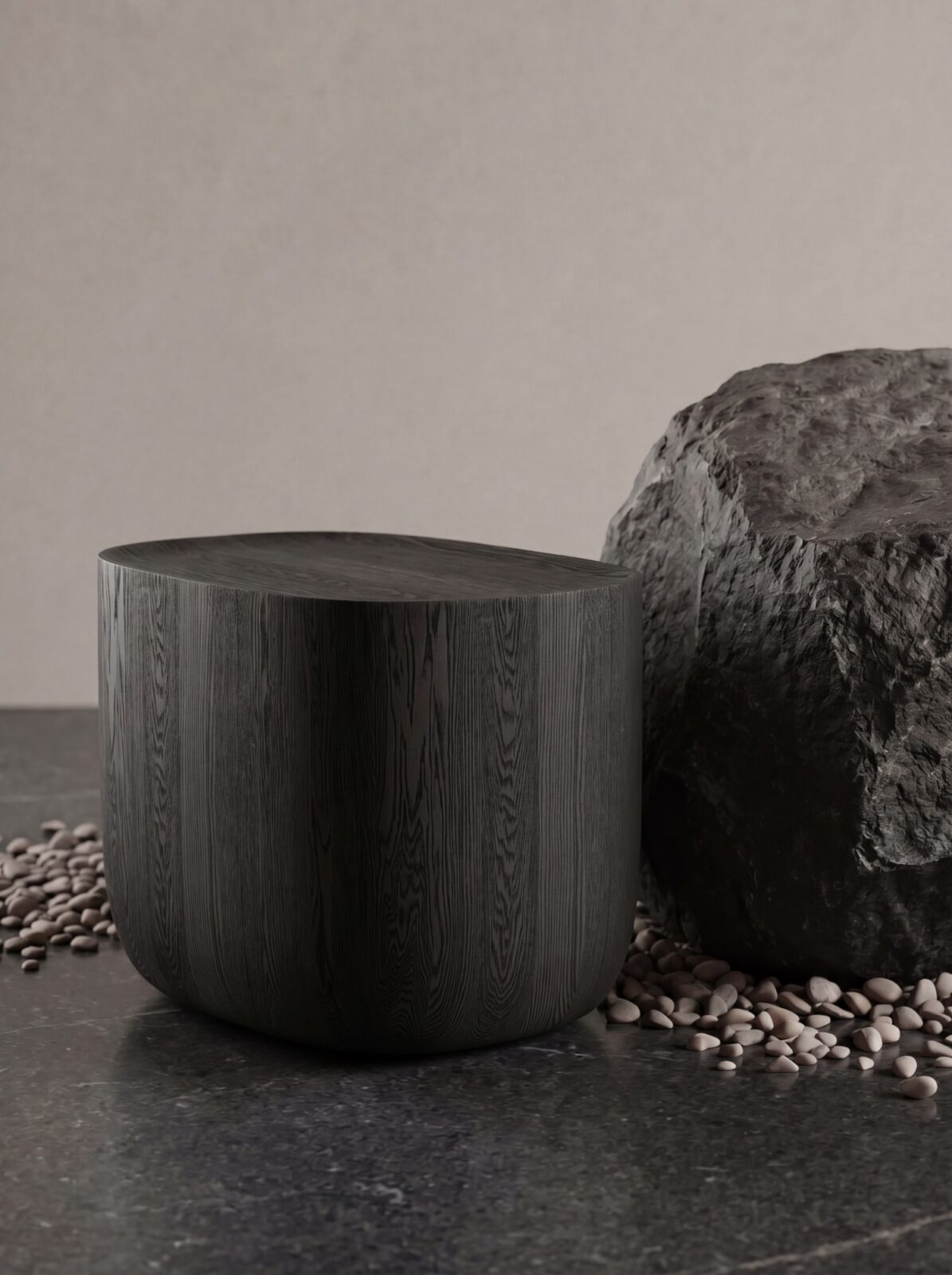 Ishi Stool next to a stone