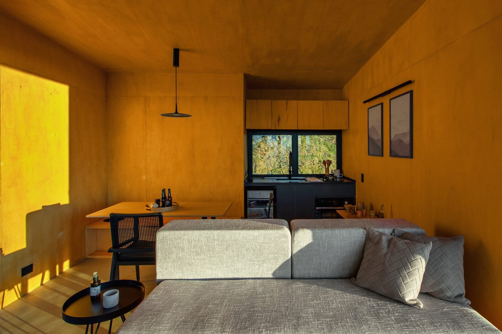Cabin Fuga Mundi with architecture by Gil Barbieri Arquitetura and Silvia Acar Arquitetura, and interior design by RAWI Arquitetura