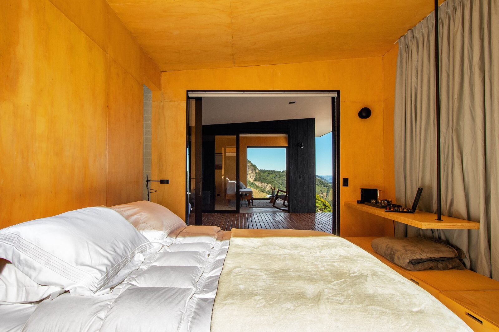 Cabin Fuga Mundi with architecture by Gil Barbieri Arquitetura and Silvia Acar Arquitetura, and interior design by RAWI Arquitetura