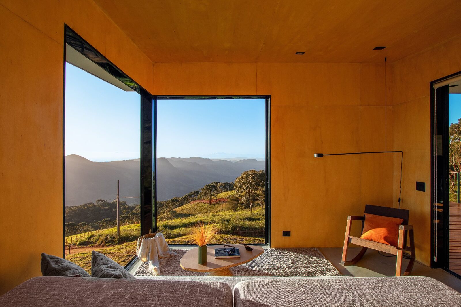 Cabin Fuga Mundi with architecture by Gil Barbieri Arquitetura and Silvia Acar Arquitetura, and interior design by RAWI Arquitetura